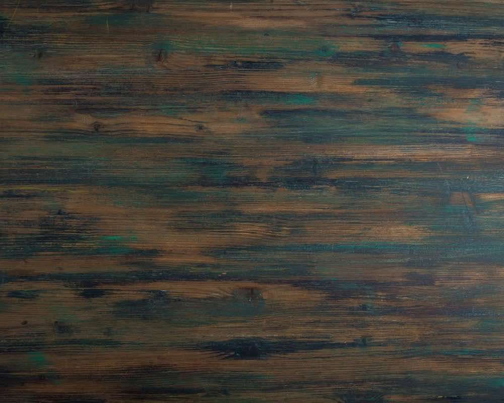 The texture of green and brown wood