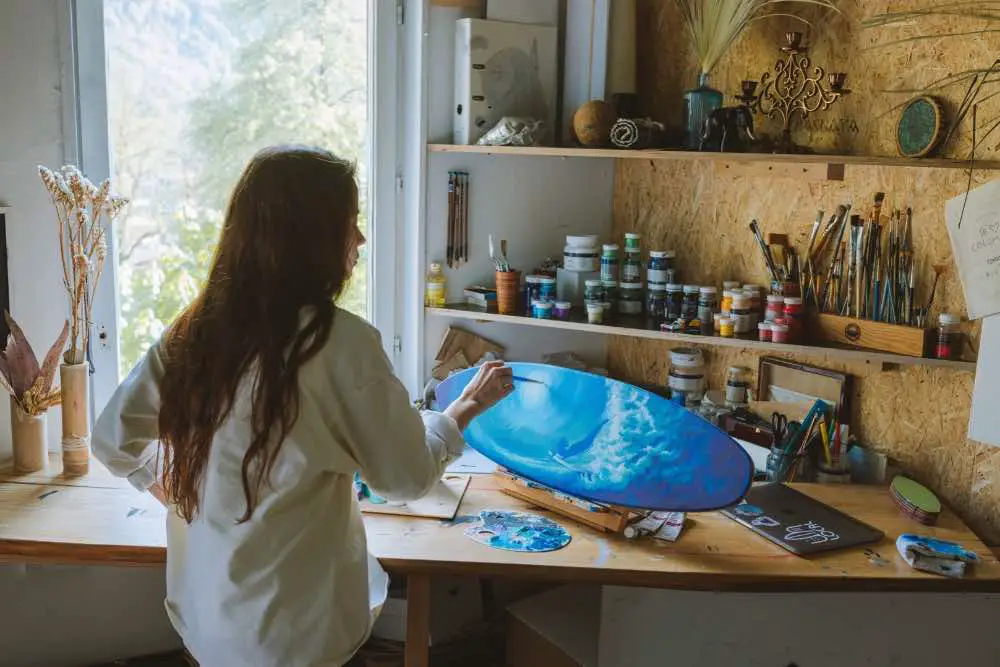A girl making an acrylic painting