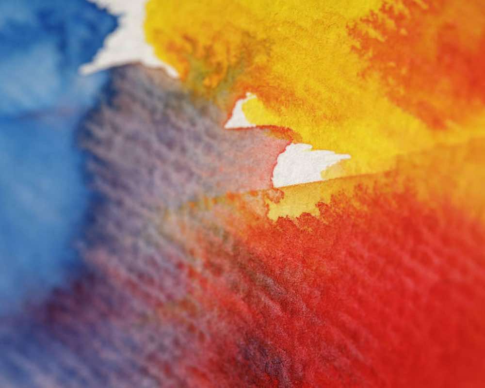 Red, yellow and blue paint combined to make grey