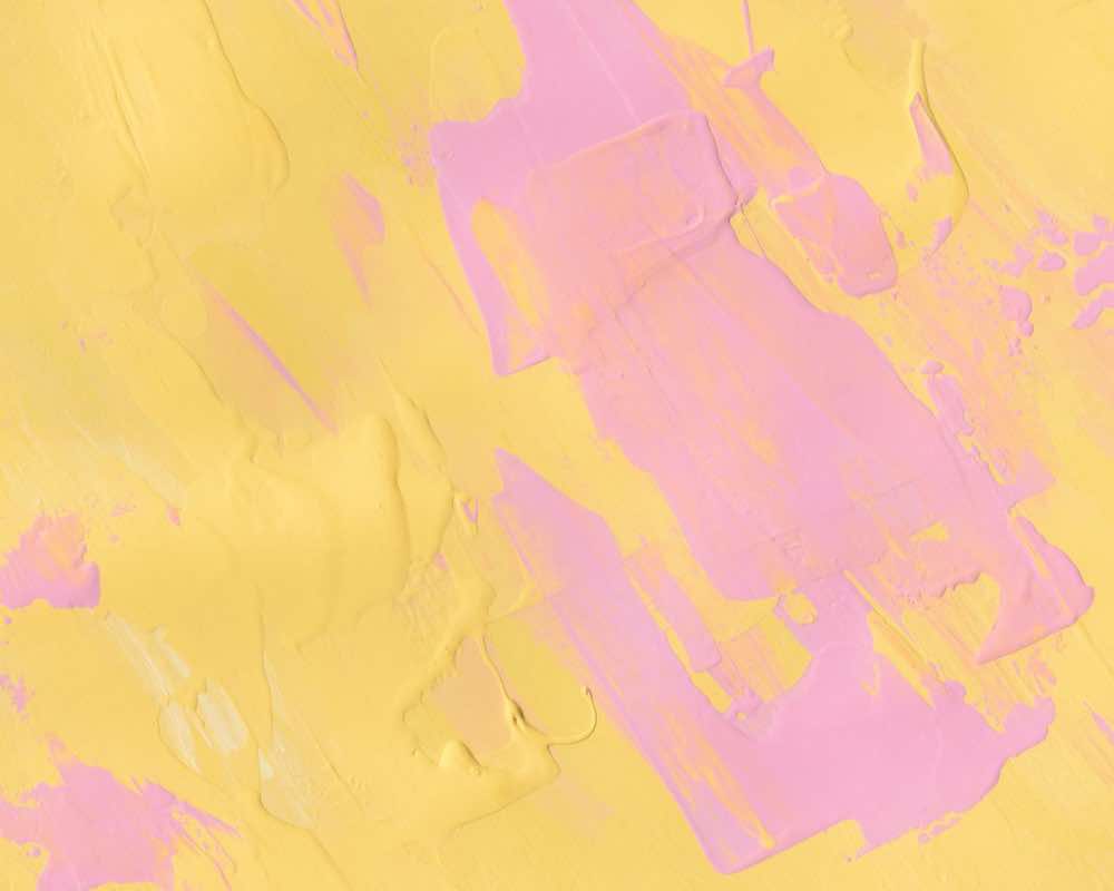 Texture of pink and yellow paint