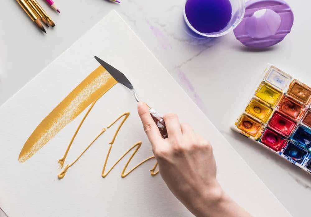 Creating texture with a knife using watercolor from a tube