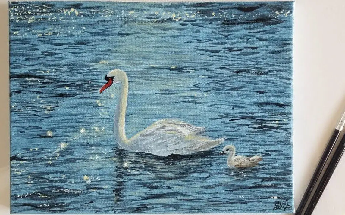 Swans in a Sparkling Lake