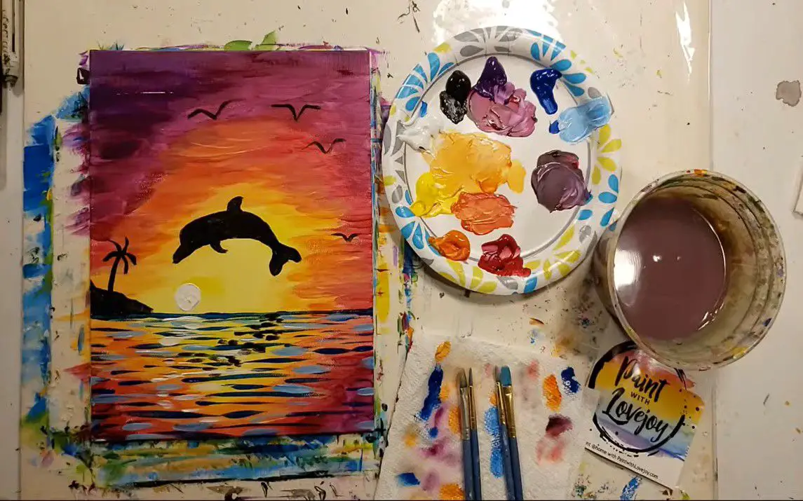 Sunset Scene with a Dolphin Silhouette