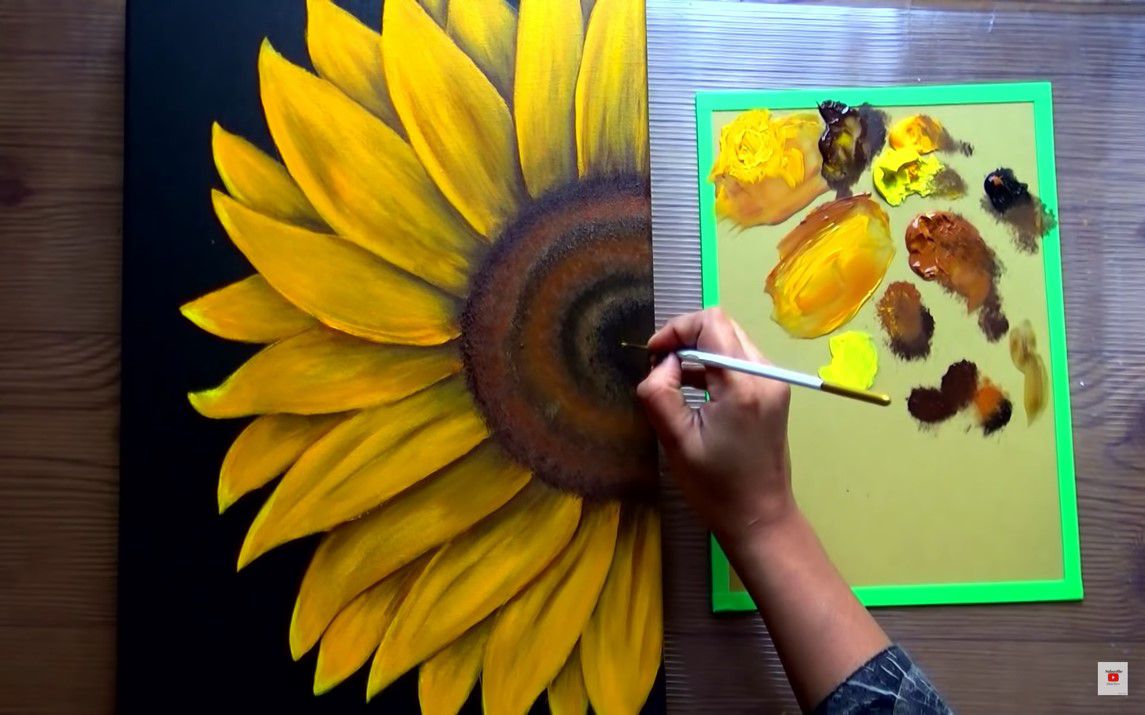 Striking painting of a Sunflower on a Black Canvas